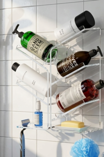 suction cup shower caddy mounted on bathroom wall